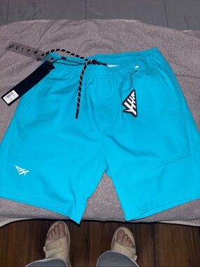 Paperplane Turquoise Athletic Swim Shorts with Logo size sm
